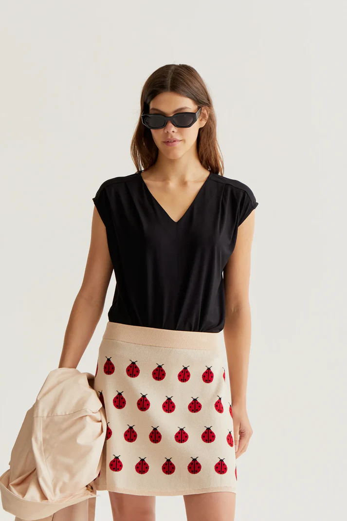 Camiseta Compañía Fantástica negra manga sisa