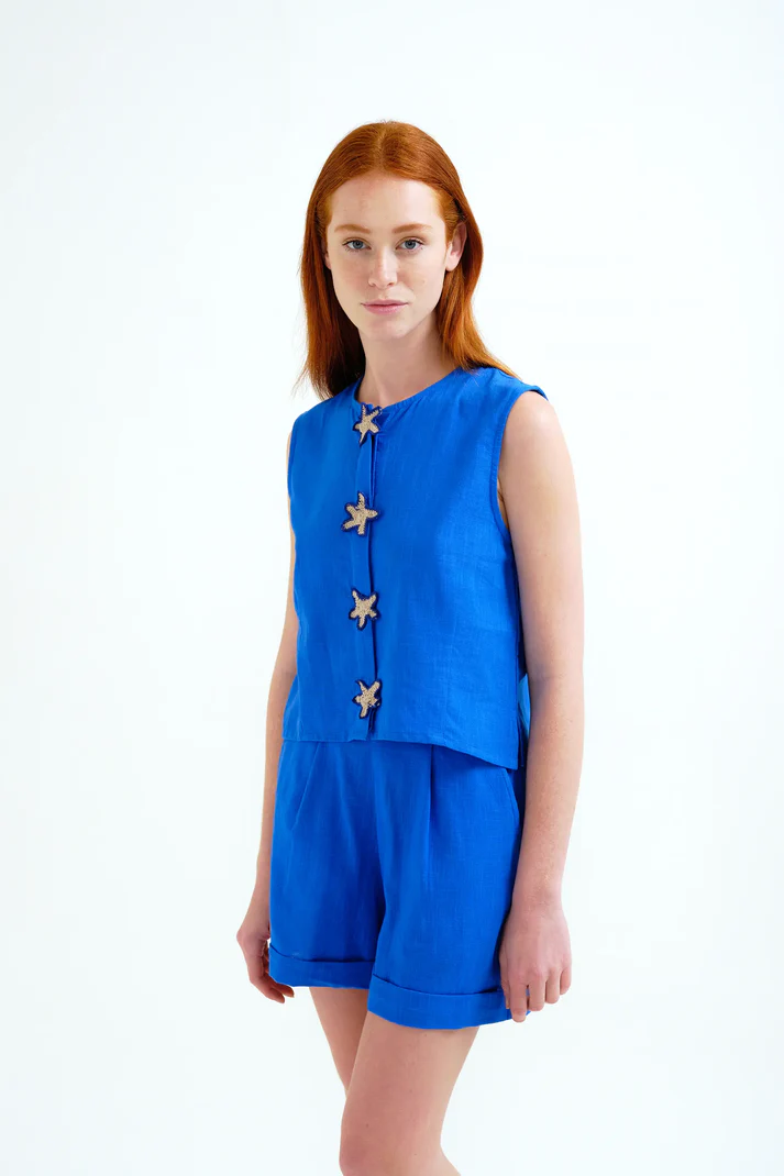 Top Compañía Fantástica azul con aplique de estrellas