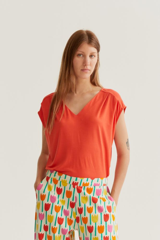 Camiseta Compañía Fantástica naranja manga sisa